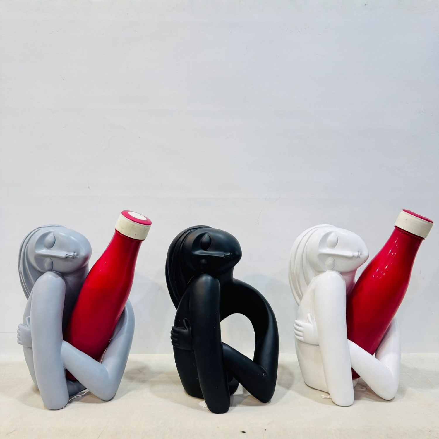 Modern Human Figurine Bottle Stand / Decorative Bottle Holder