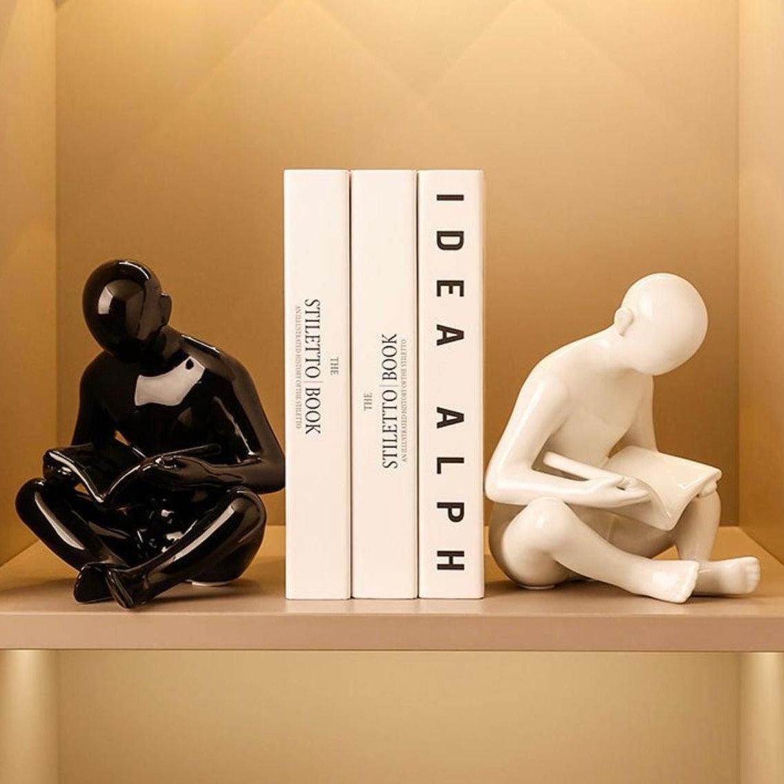 Man Reading a book sculpture