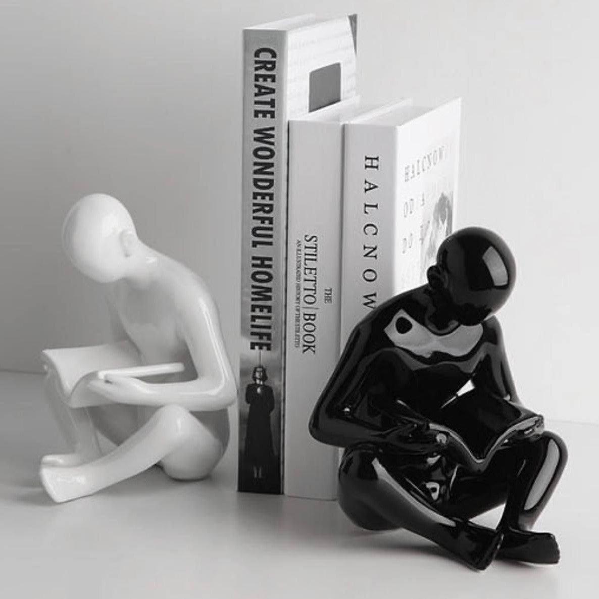 Man Reading a book sculpture
