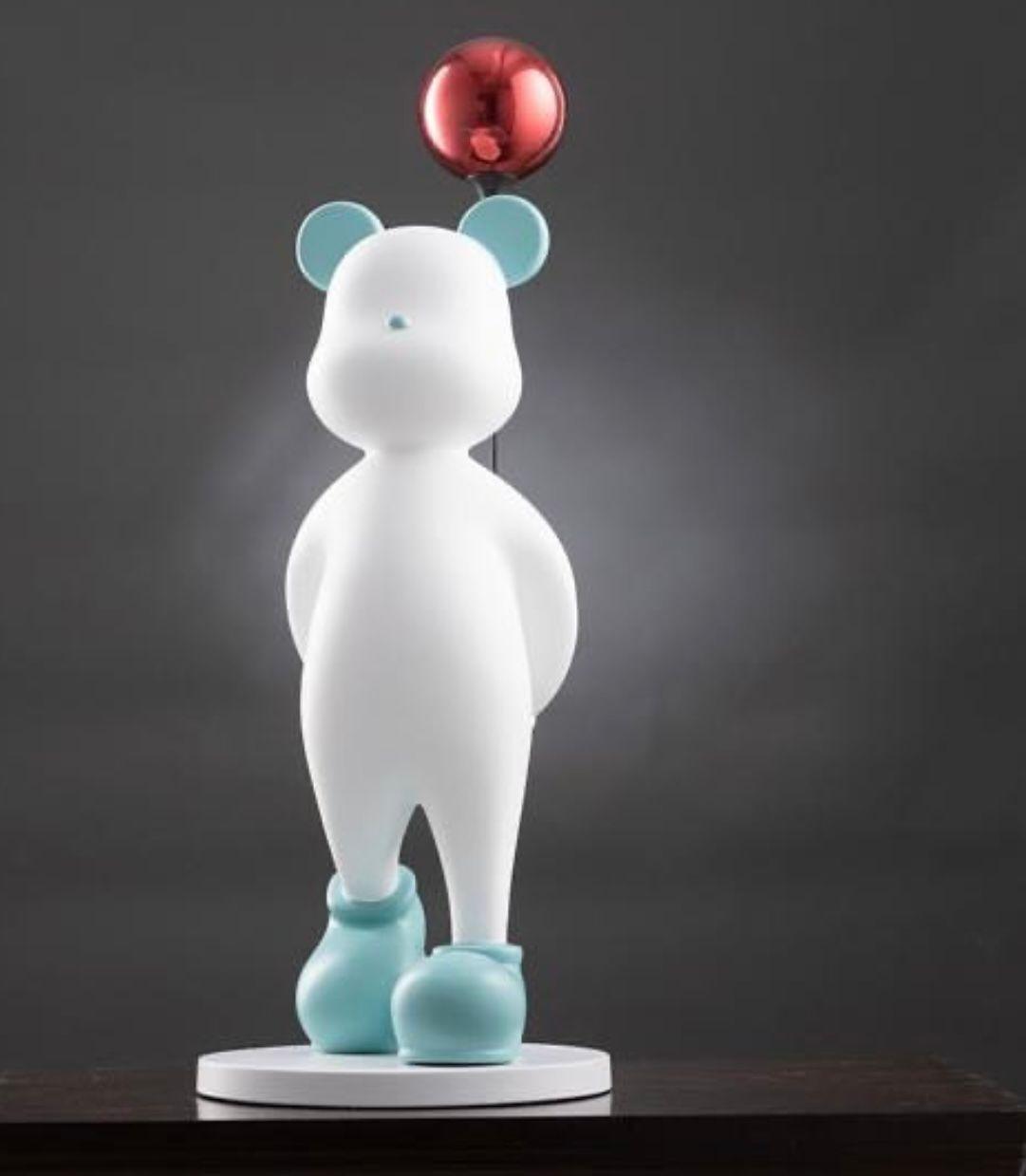 SNOWMAN HOLDING A BALLOON