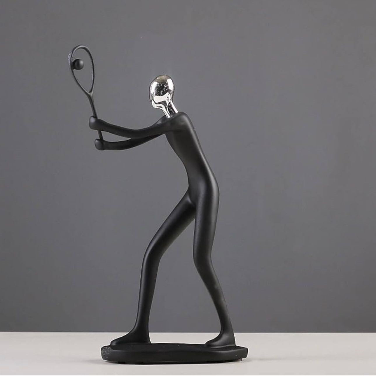 SPORTS FIGURINE - TENNIS PLAYER