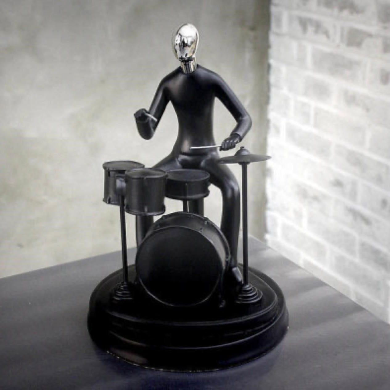 MUSICAL DRUMMER FIGURINE