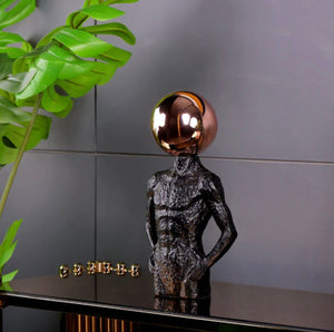 ELECTROPLATED SPHERE HEAD MAN SCULPTURE