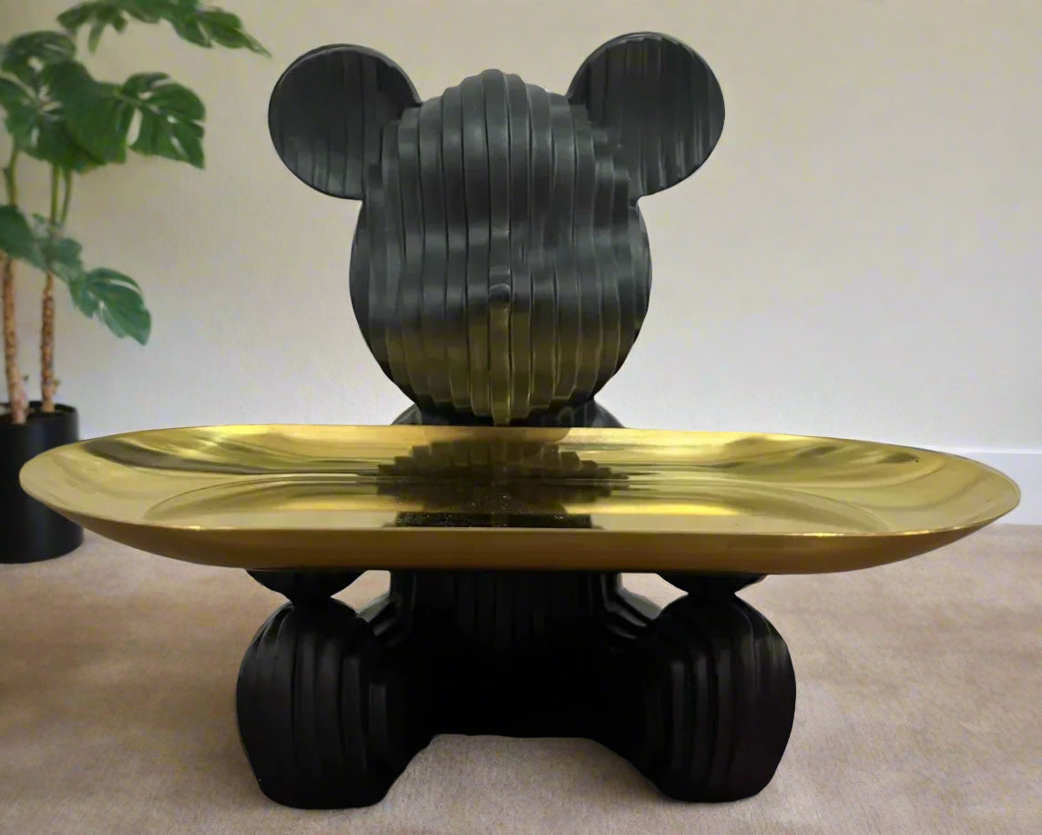 Patterned Mickey Sitting With a Tray