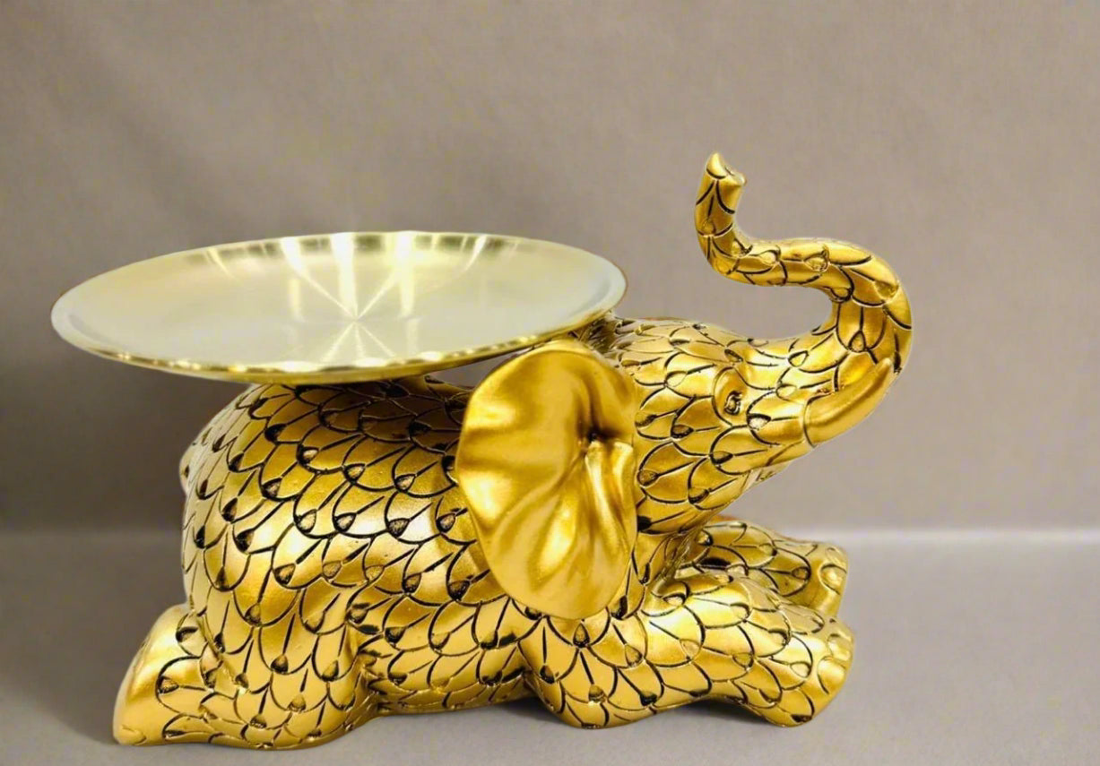 Joyful elephant with a tray