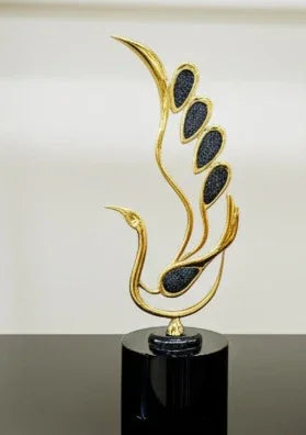 Golden plume sculpture