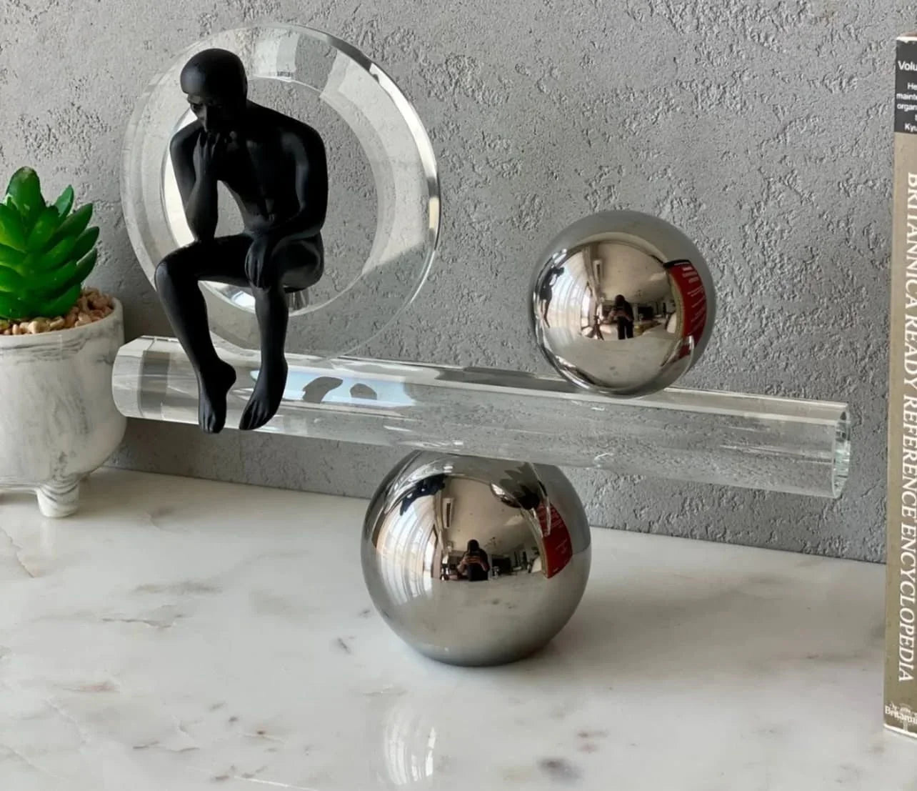 Human in a timeless crystal balance