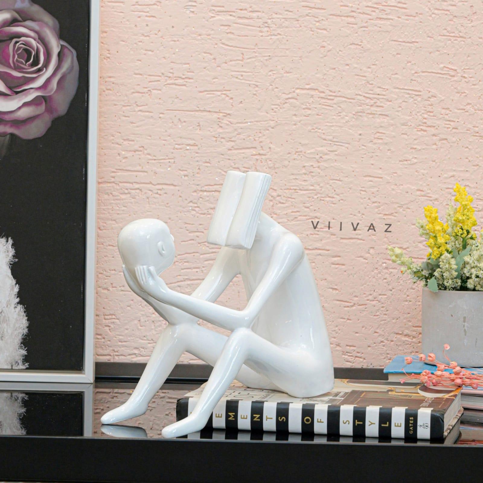 Abstract Man Reading a book sculpture