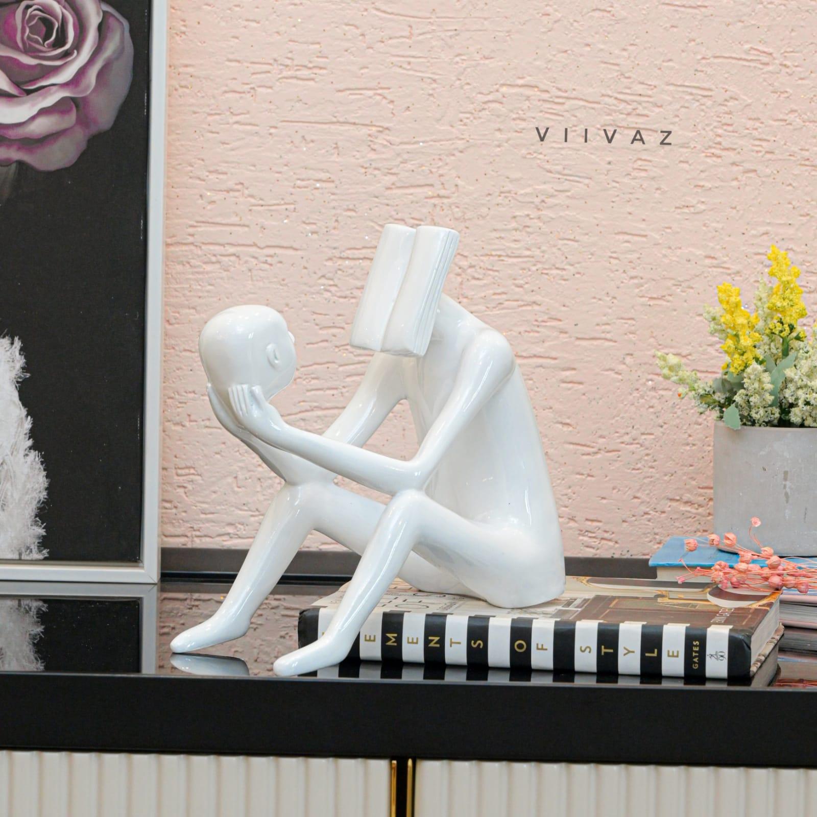 Abstract Man Reading a book sculpture