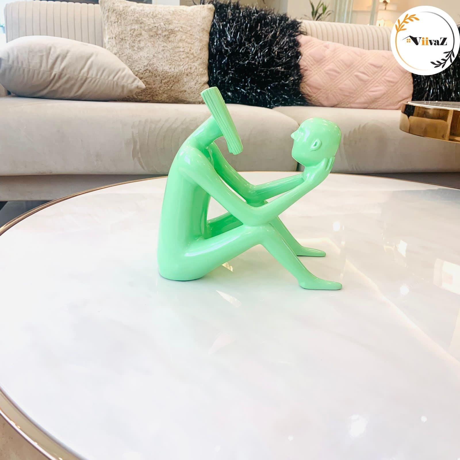 Abstract Man Reading a book sculpture