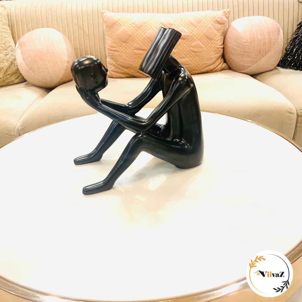 Abstract Man Reading a book sculpture