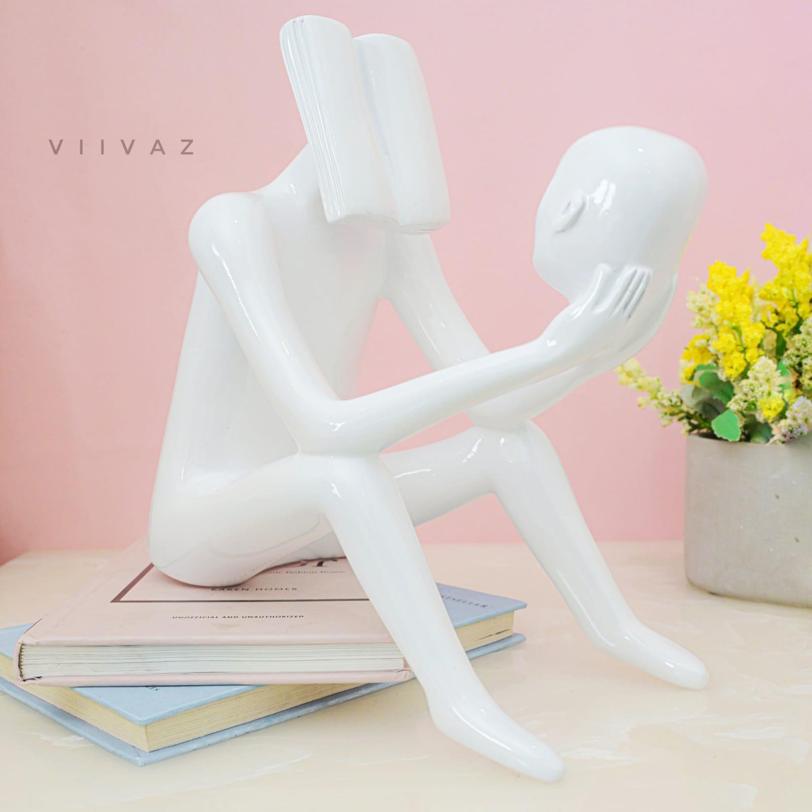 Abstract Man Reading a book sculpture