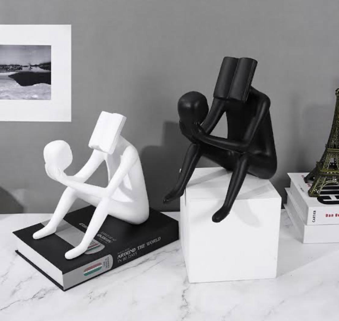 Abstract Man Reading a book sculpture