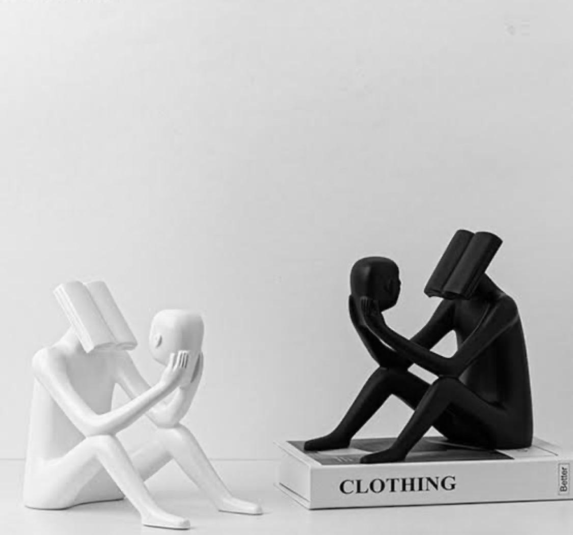 Abstract Man Reading a book sculpture