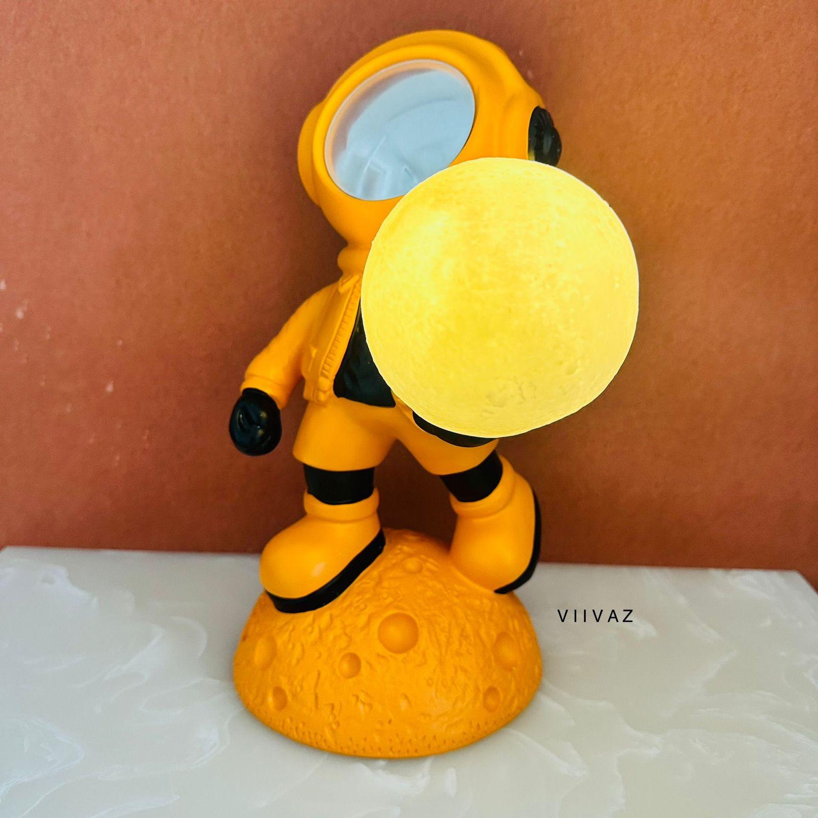 Astronaut Holding Moon