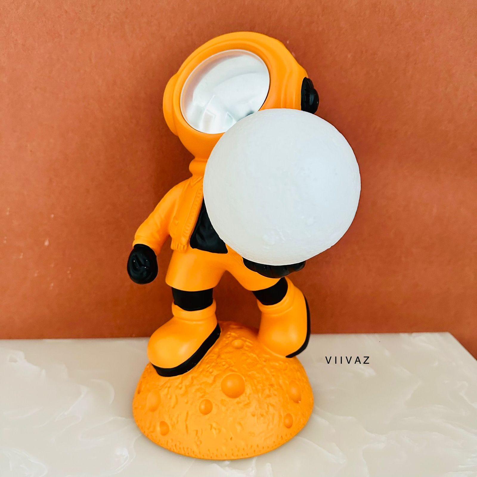 Astronaut Holding Moon