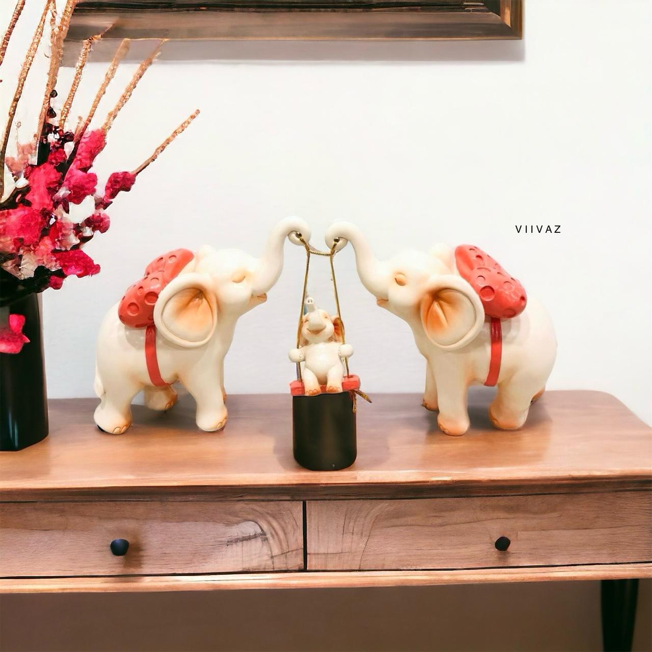 Baby with Parent Elephant