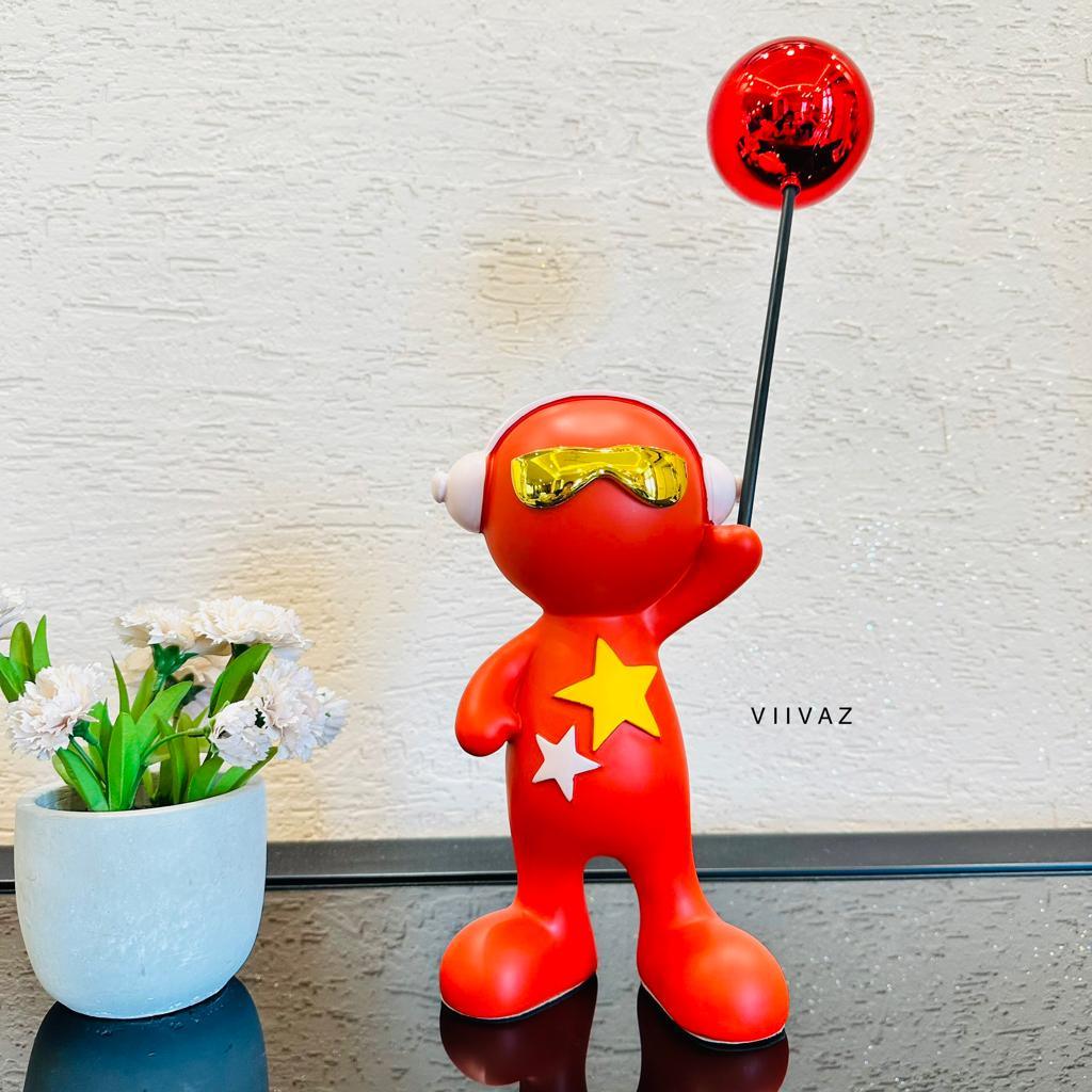 Celebrating Alien with Balloon