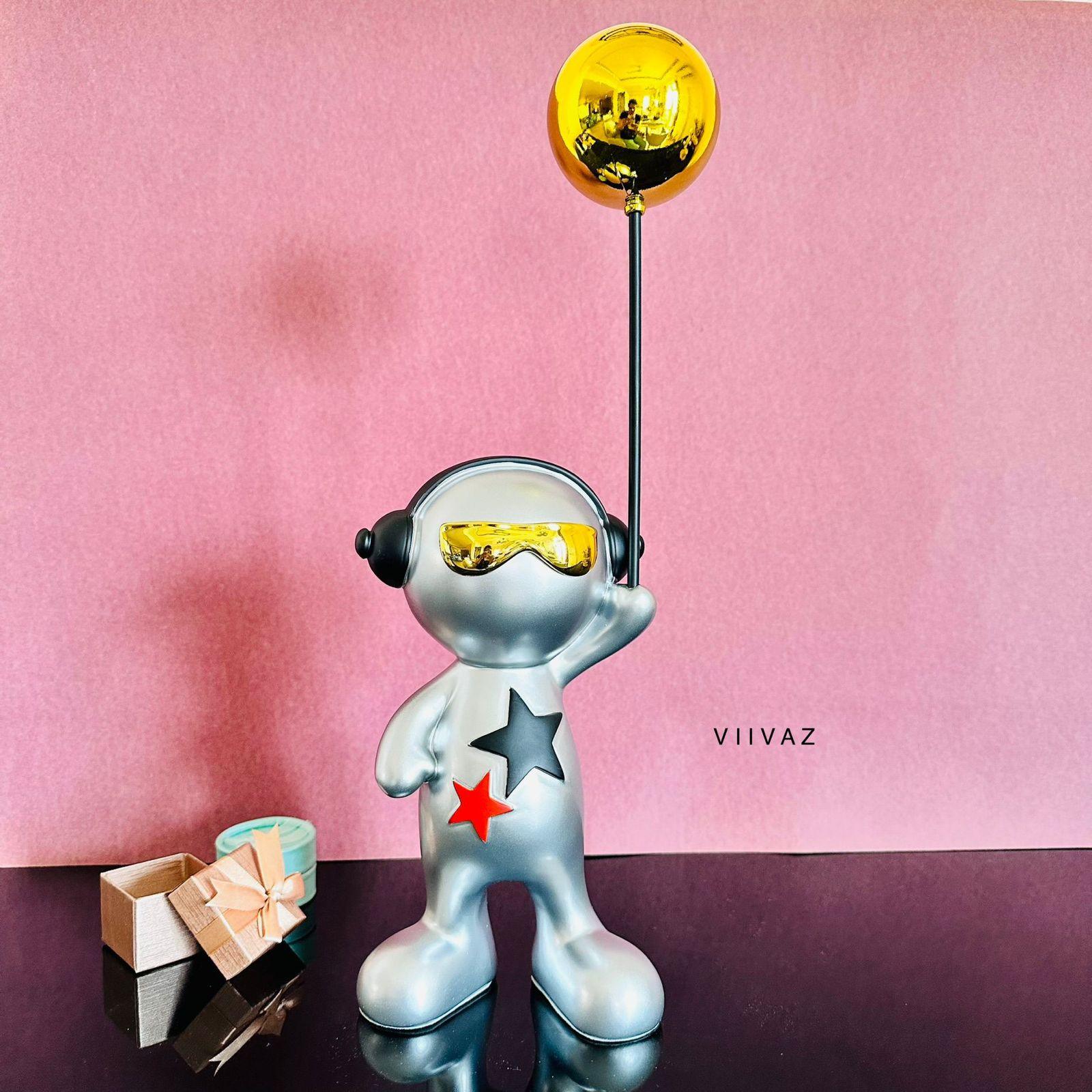 Celebrating Alien with Balloon