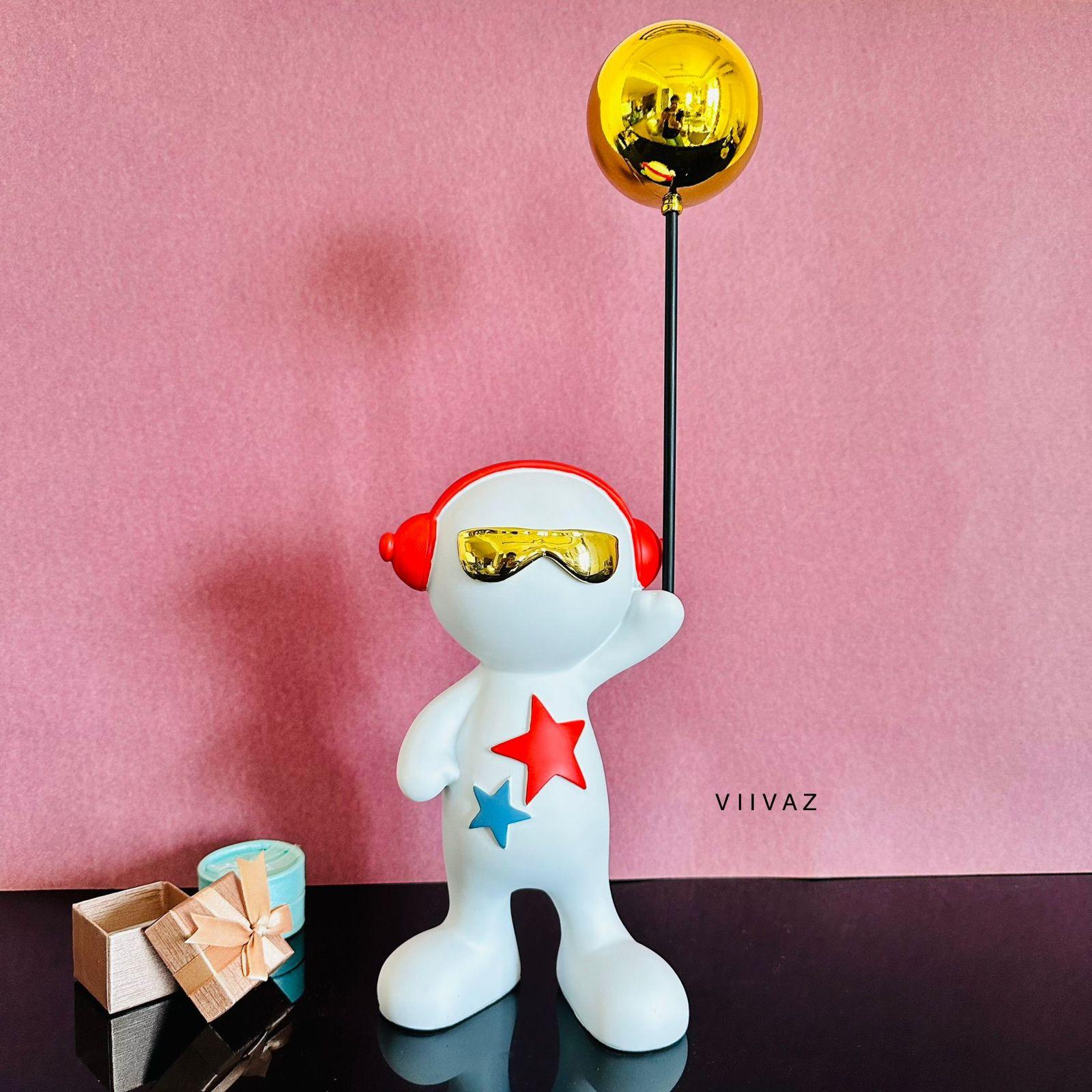 Celebrating Alien with Balloon