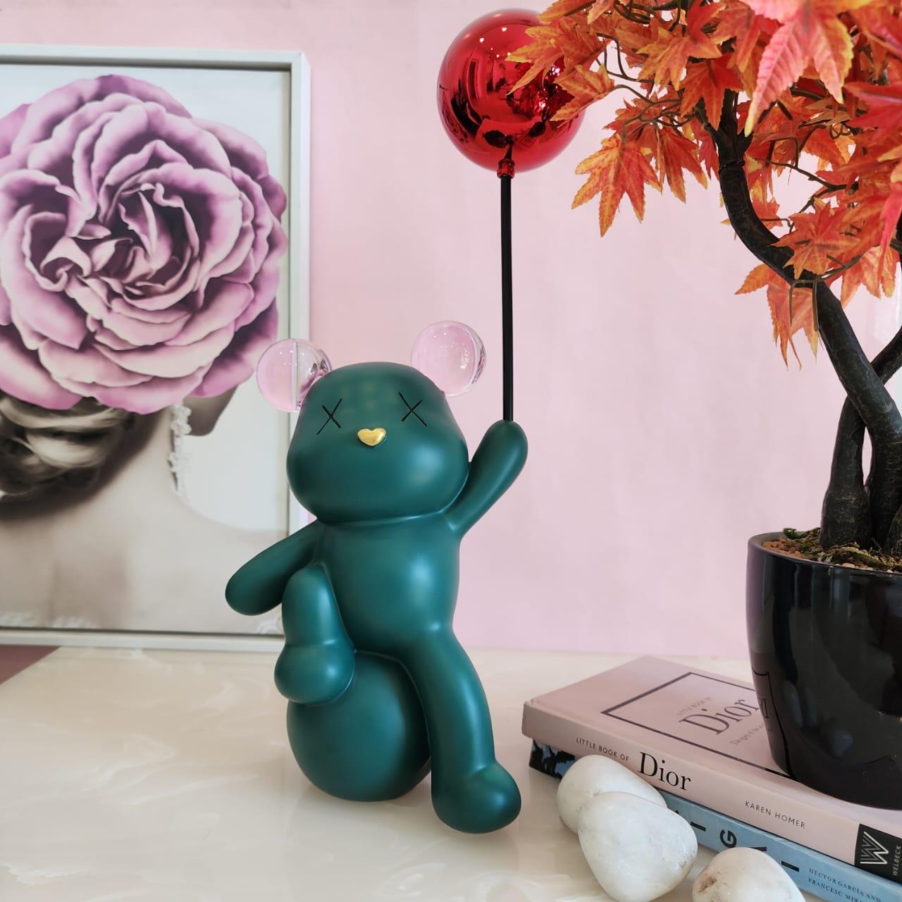 Celebrating Teddy Bear Holding a balloon