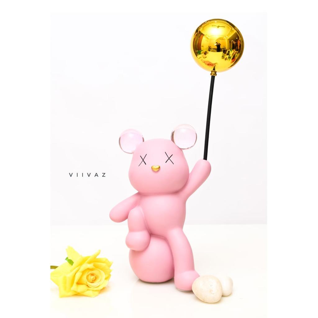 Celebrating Teddy Bear Holding a balloon