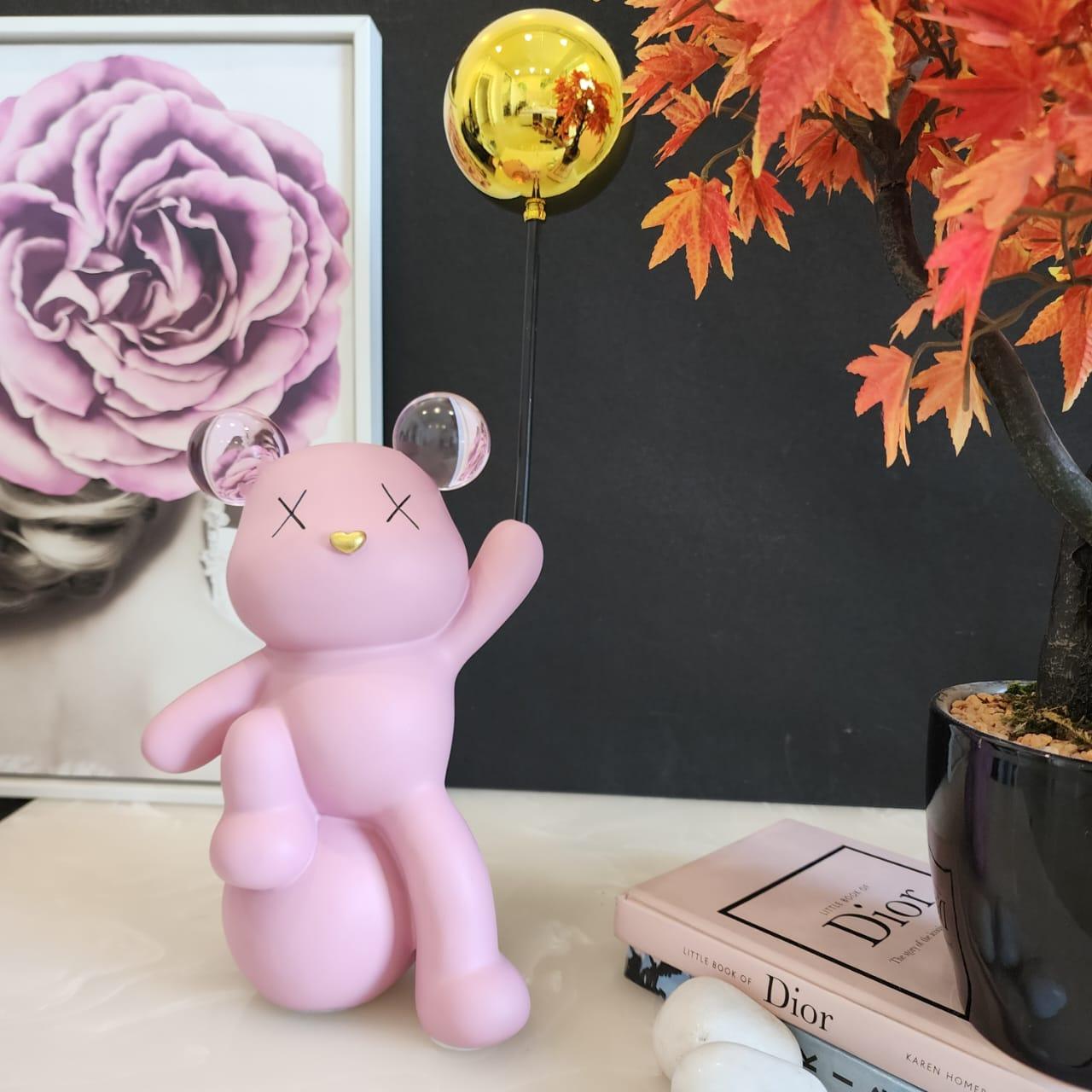 Celebrating Teddy Bear Holding a balloon