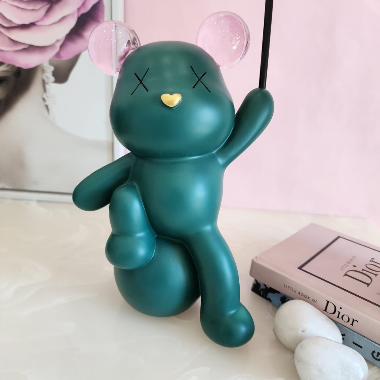 Celebrating Teddy Bear Holding a balloon