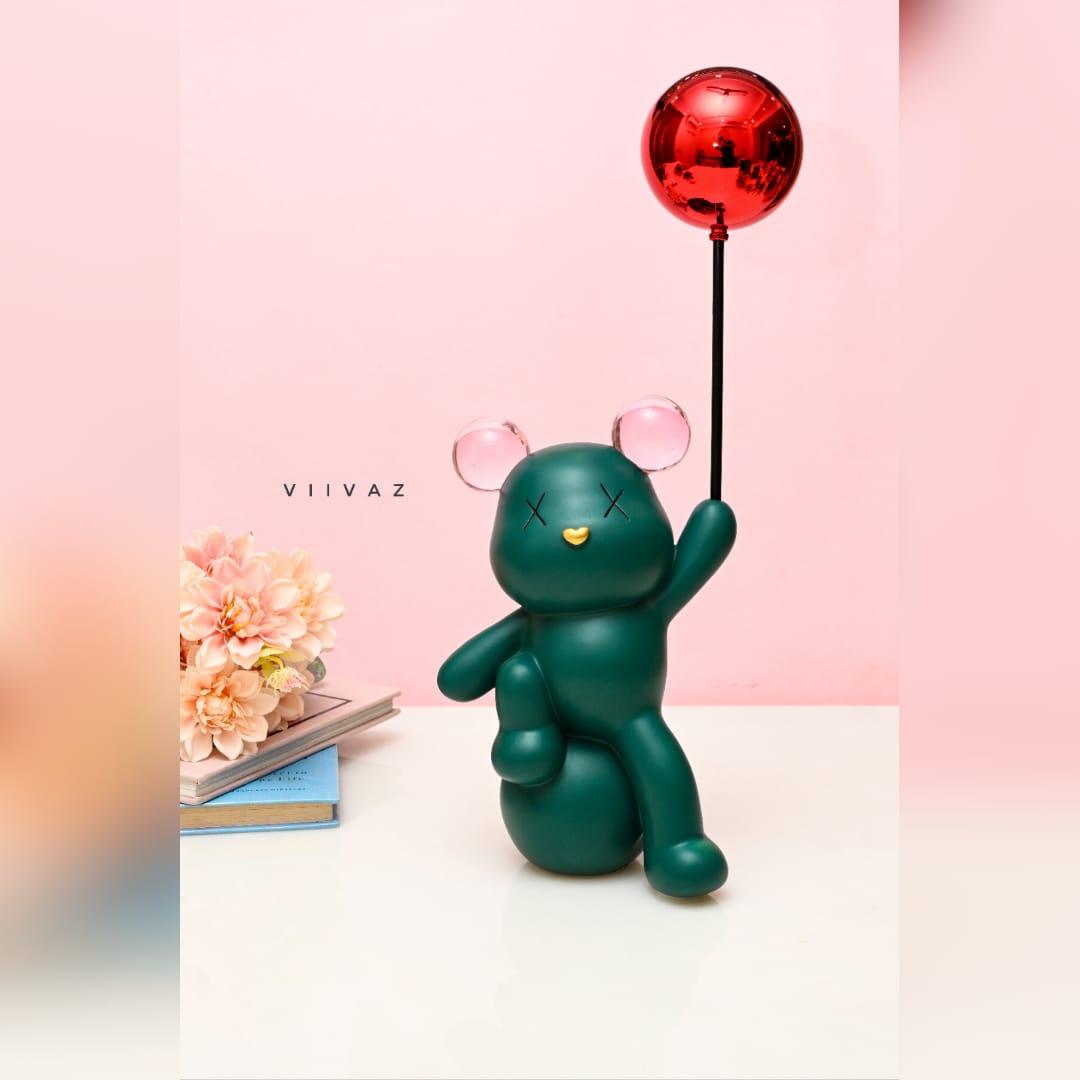 Celebrating Teddy Bear Holding a balloon