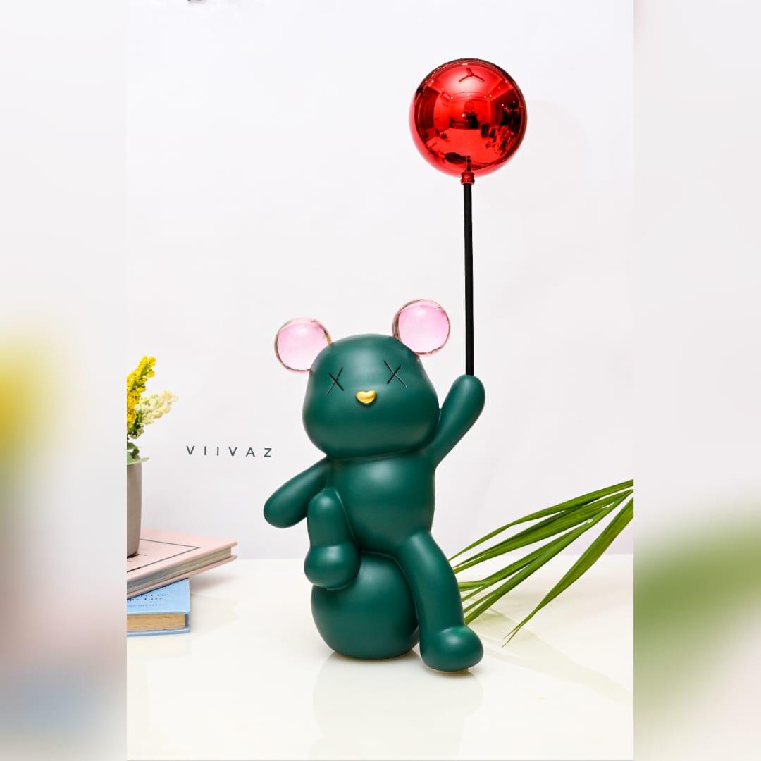 Celebrating Teddy Bear Holding a balloon