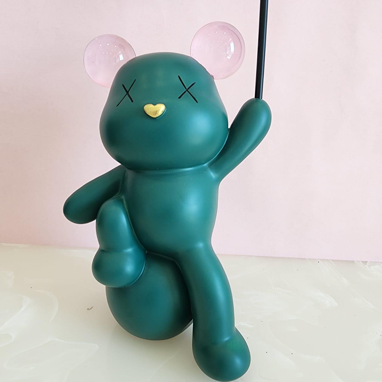 Celebrating Teddy Bear Holding a balloon