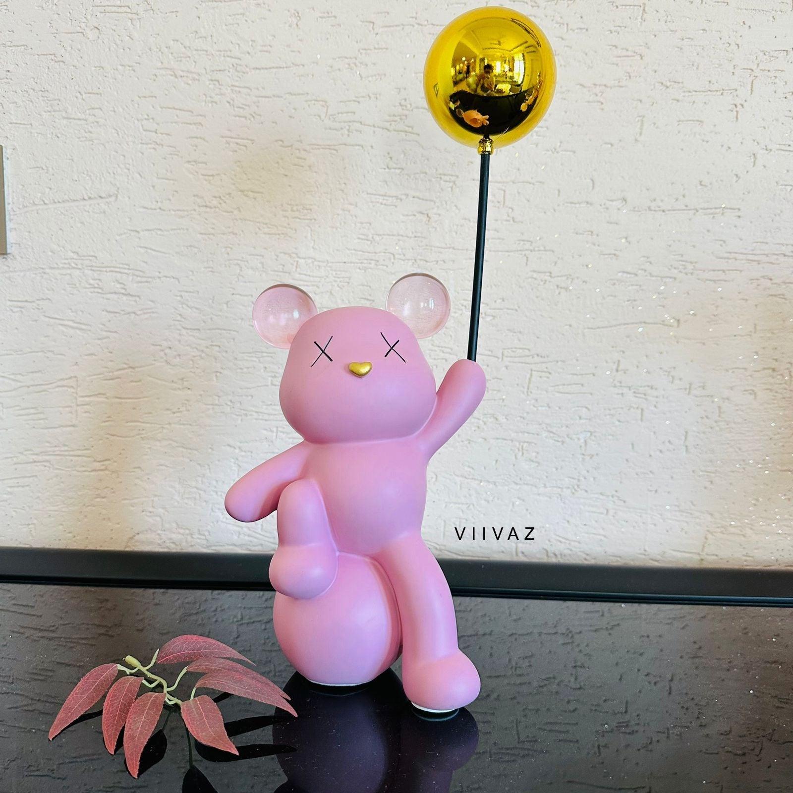 Celebrating Teddy Bear Holding a balloon