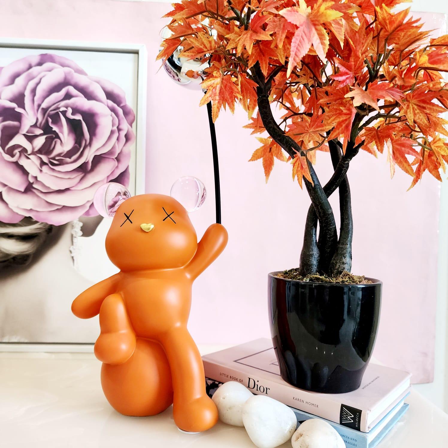 Celebrating Teddy Bear Holding a balloon