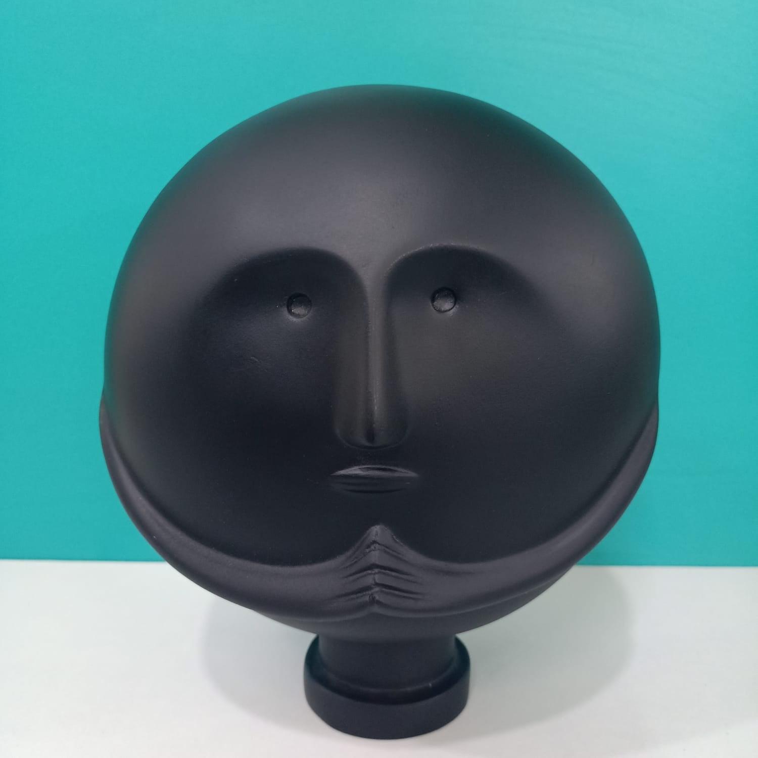 CLEVER CLAY MAN SCULPTURE