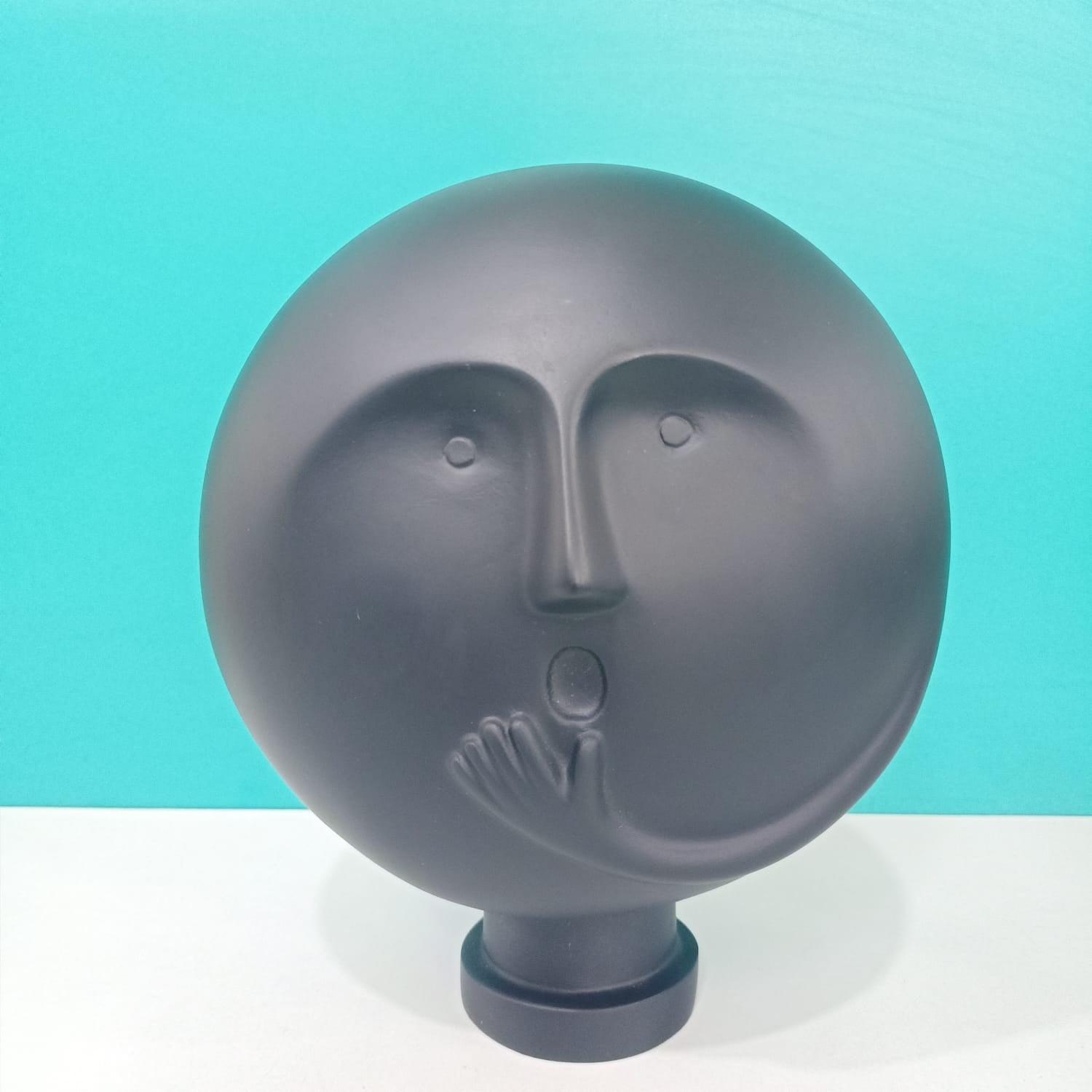 CLEVER CLAY MAN SCULPTURE