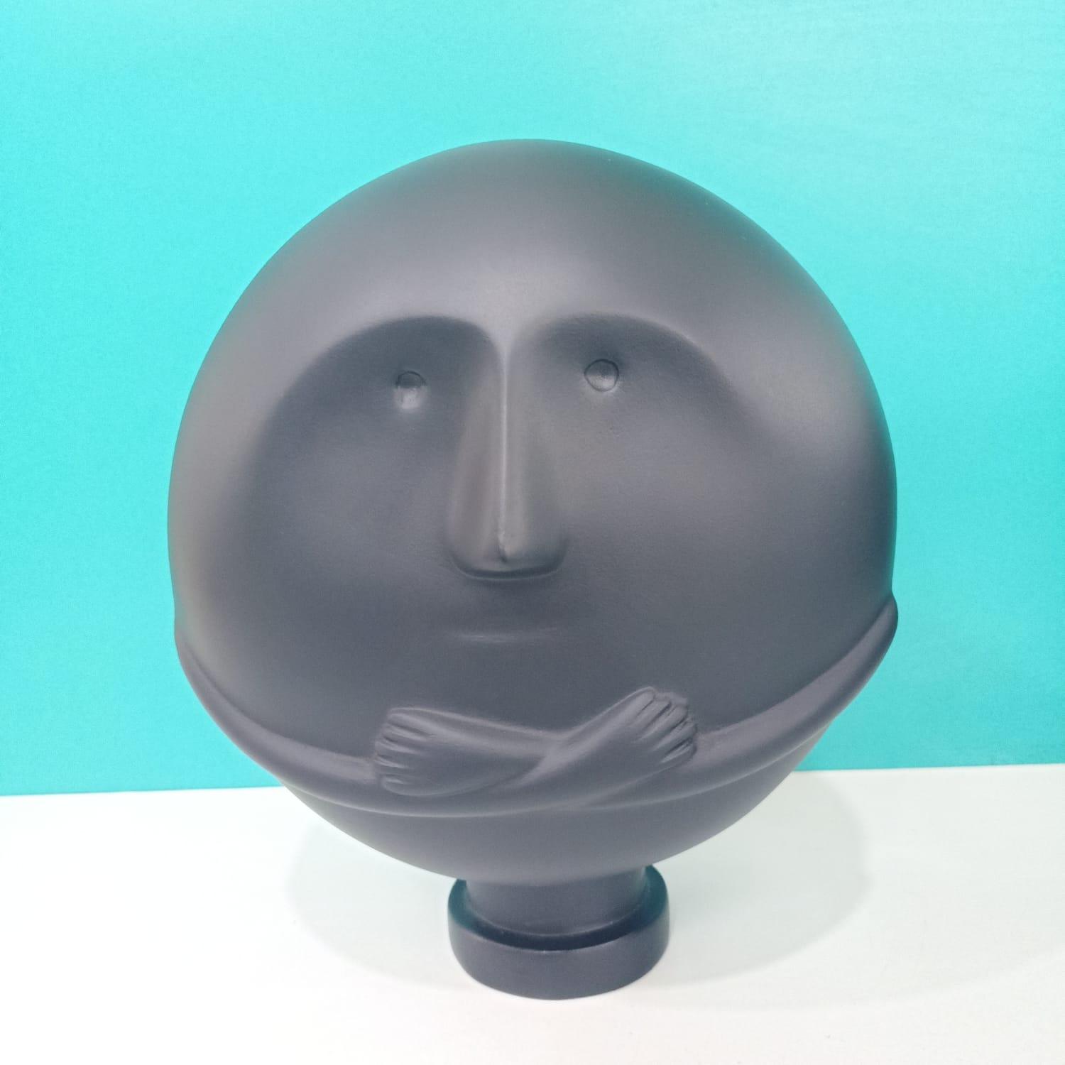 CLEVER CLAY MAN SCULPTURE