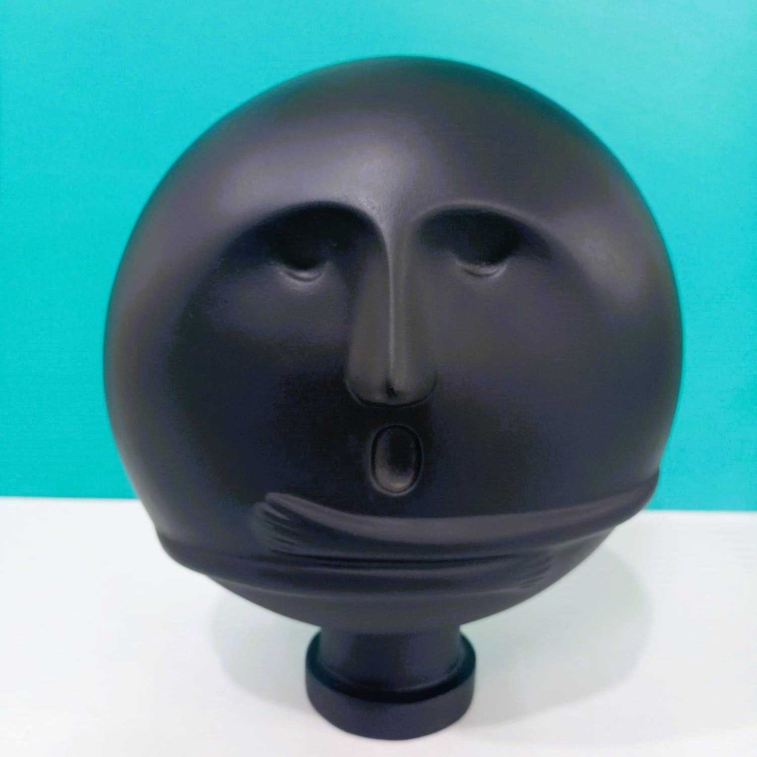 CLEVER CLAY MAN SCULPTURE