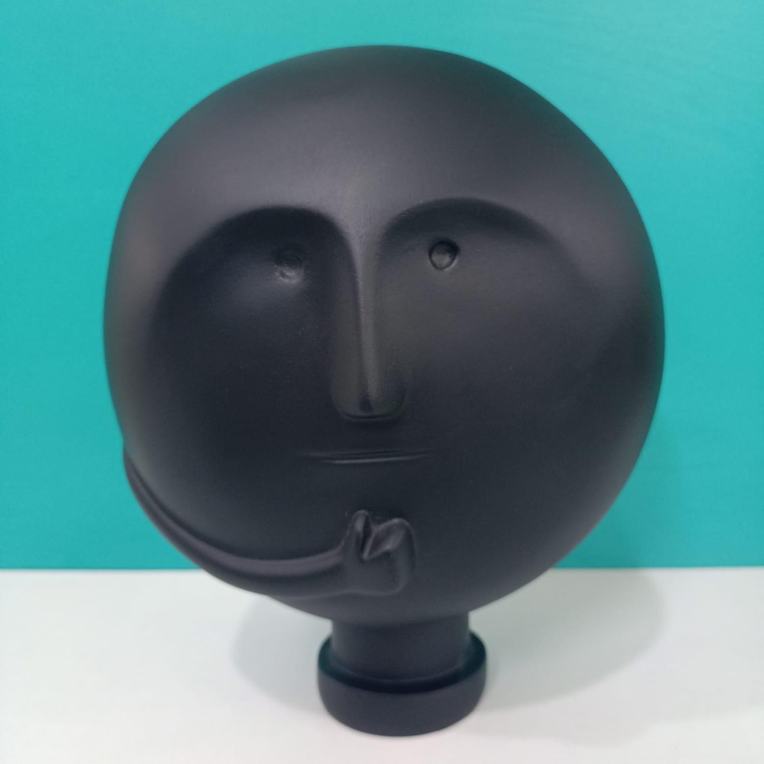 CLEVER CLAY MAN SCULPTURE