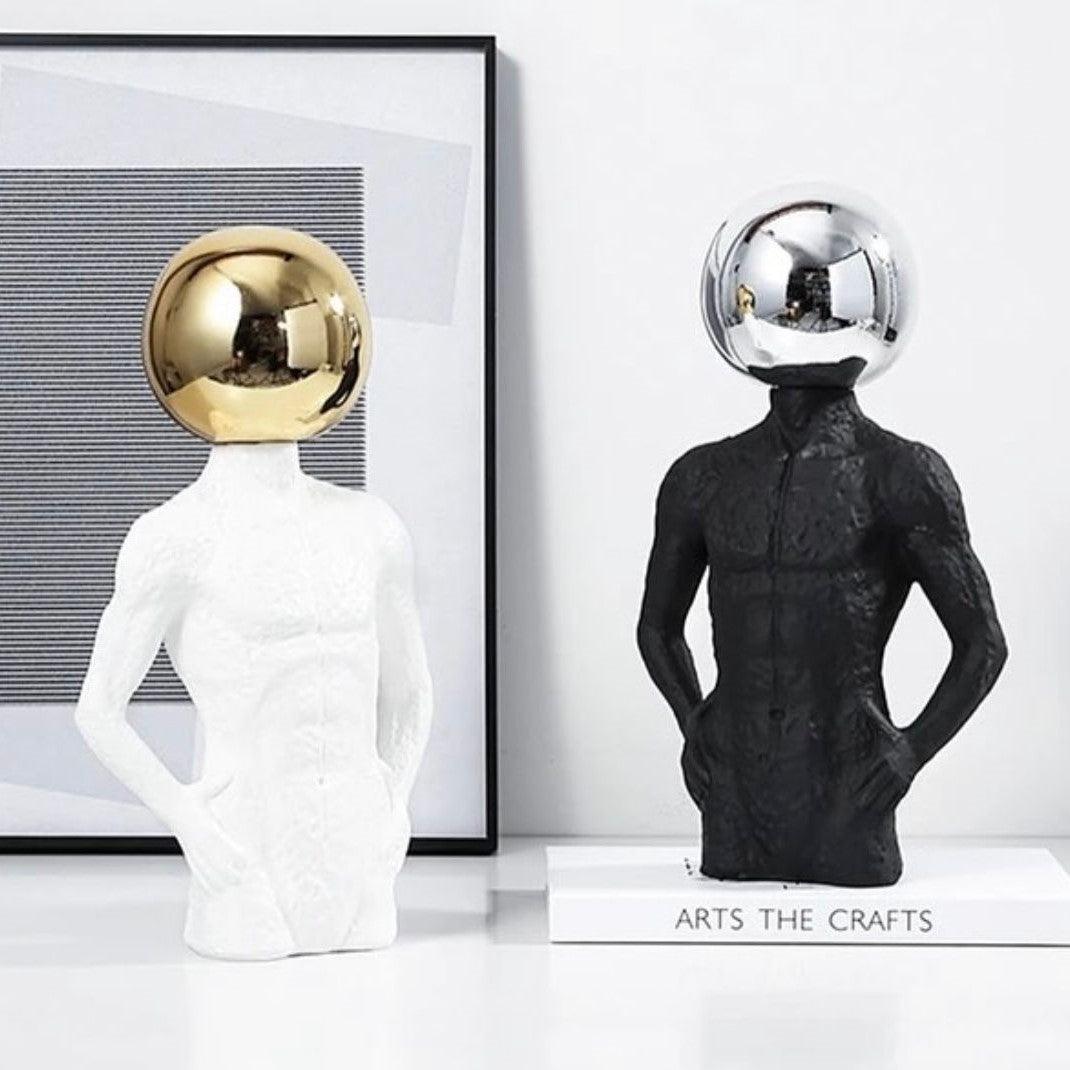 ELECTROPLATED SPHERE HEAD MAN SCULPTURE