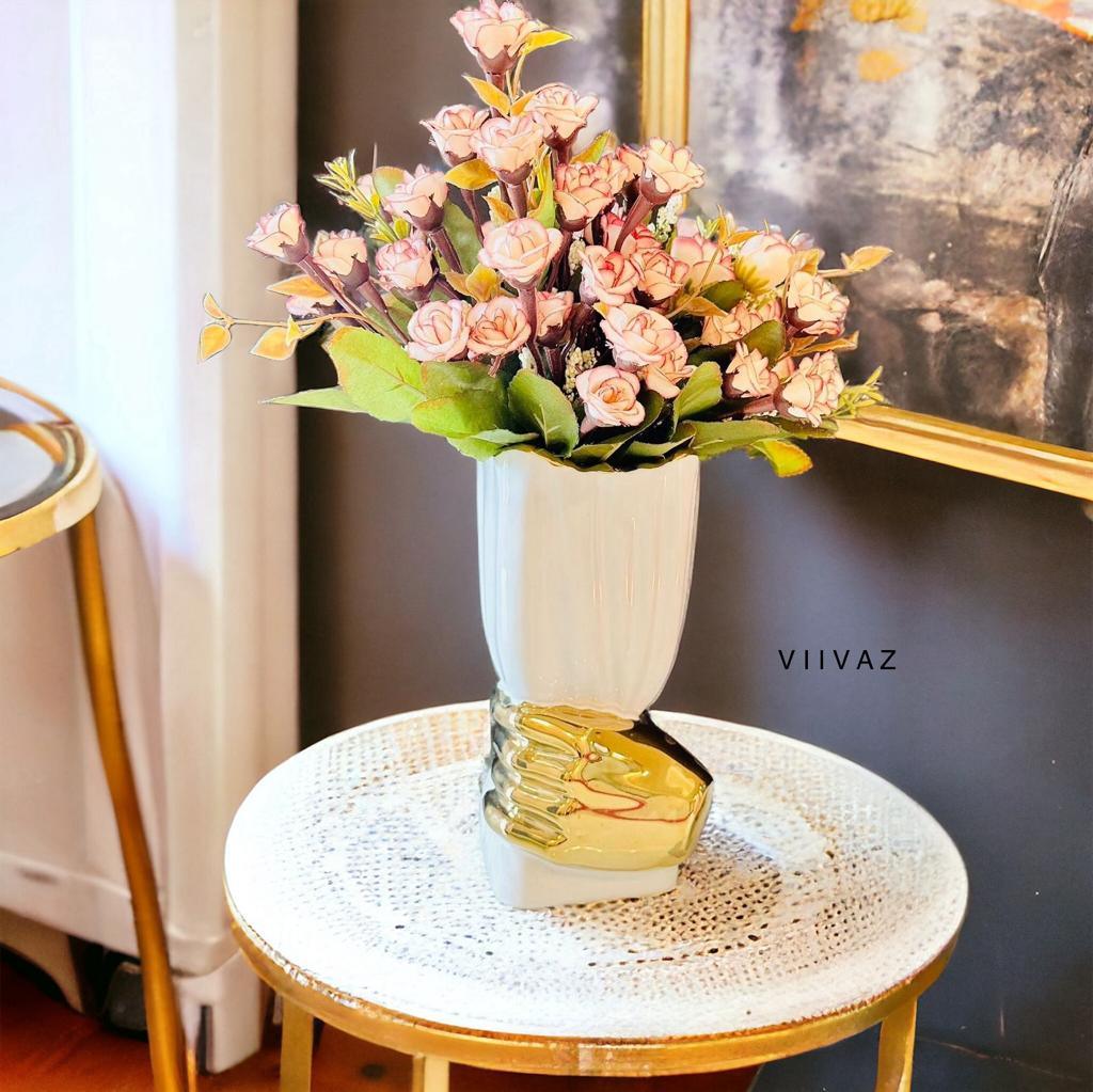 Hand Holding Cup Vase