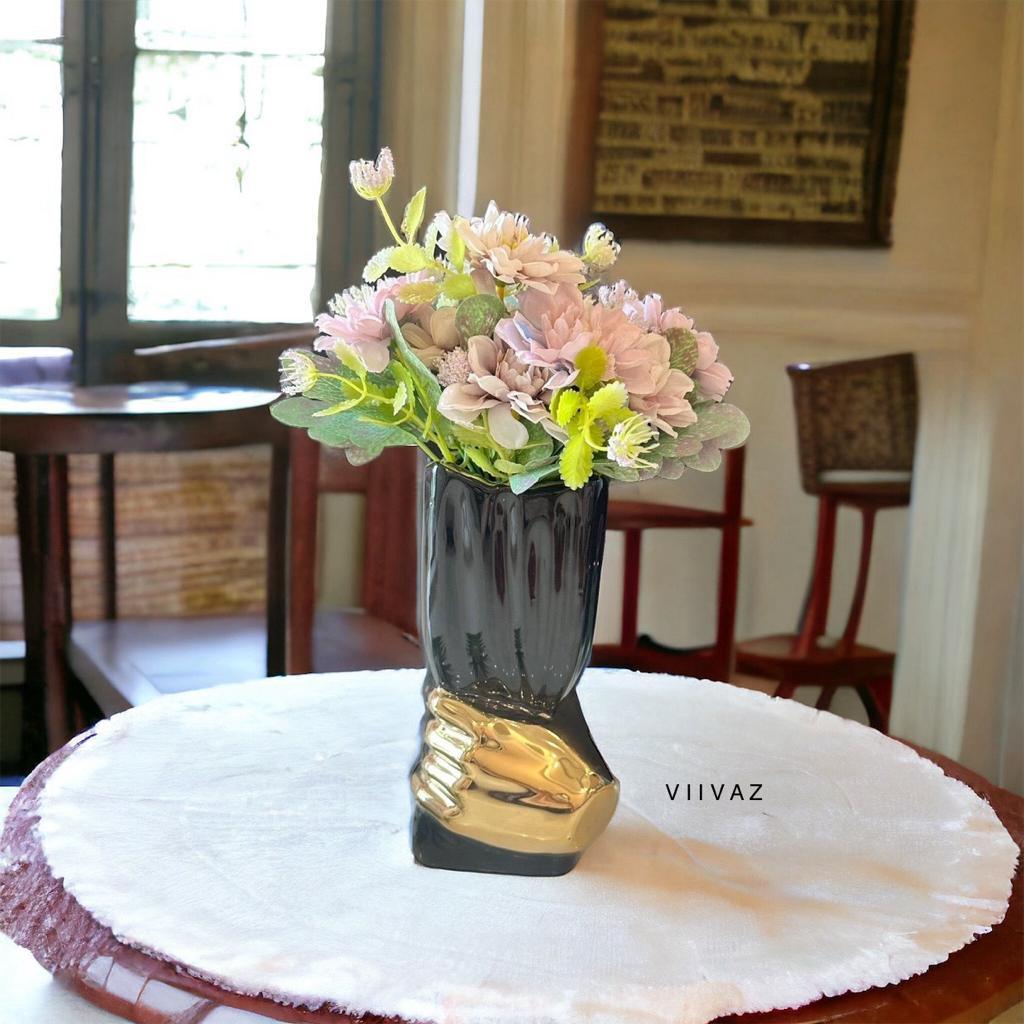 Hand Holding Cup Vase